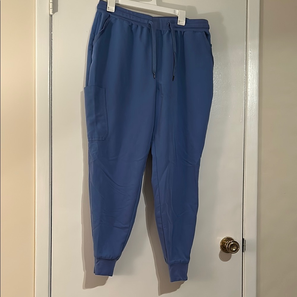 Jaanuu Blue Track Pants with Elastic Cuffs and Tapered Fit